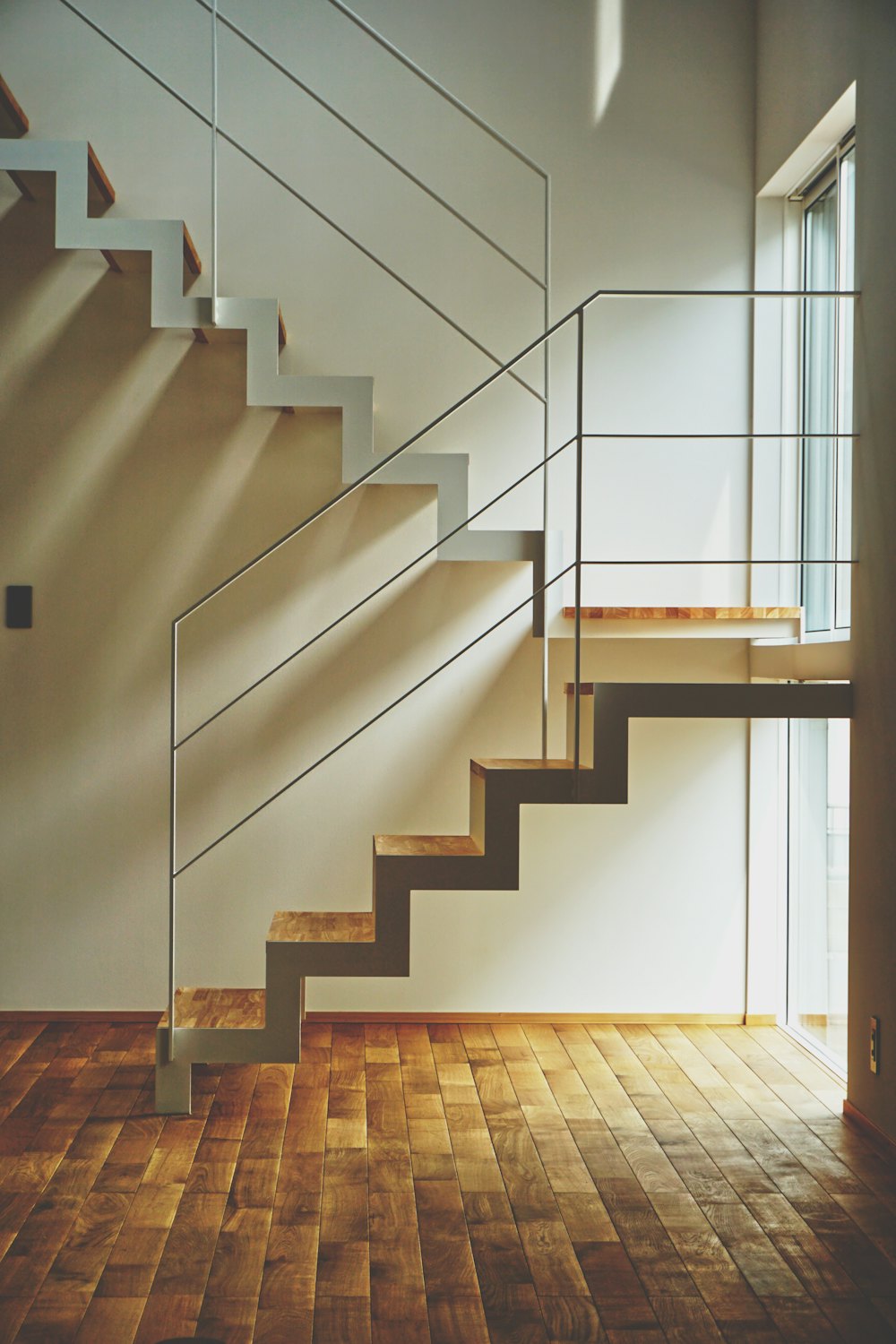 A finished staircase with new treads